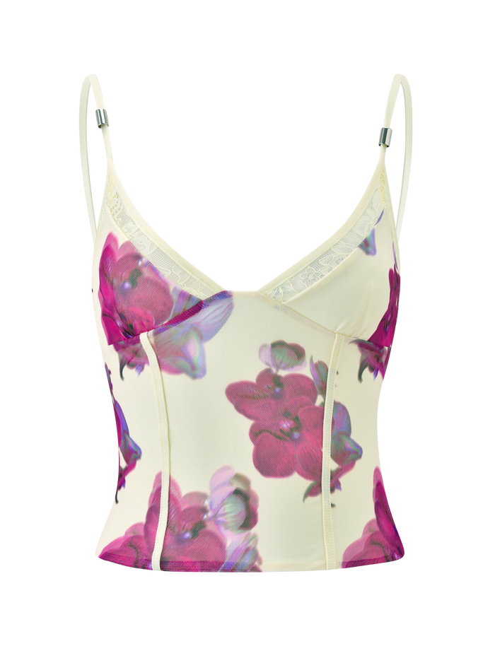 The LILIAH PANEL CAMI TOP - ORCHID HAZE by TIGERMIST features a cream mesh design with thin adjustable straps, light boning, and bold pink and purple floral patterns.