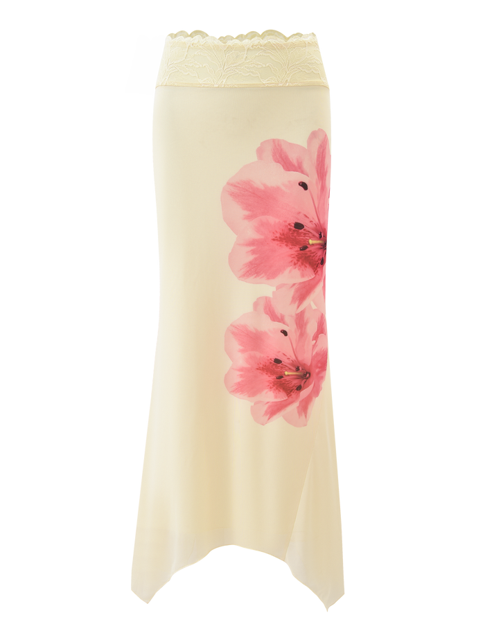 The LILLIAN SKIRT - YELLOW by TIGERMIST features an asymmetrical hem, cream color, delicate lace-trimmed waistband, and two bold pink floral prints on one side.