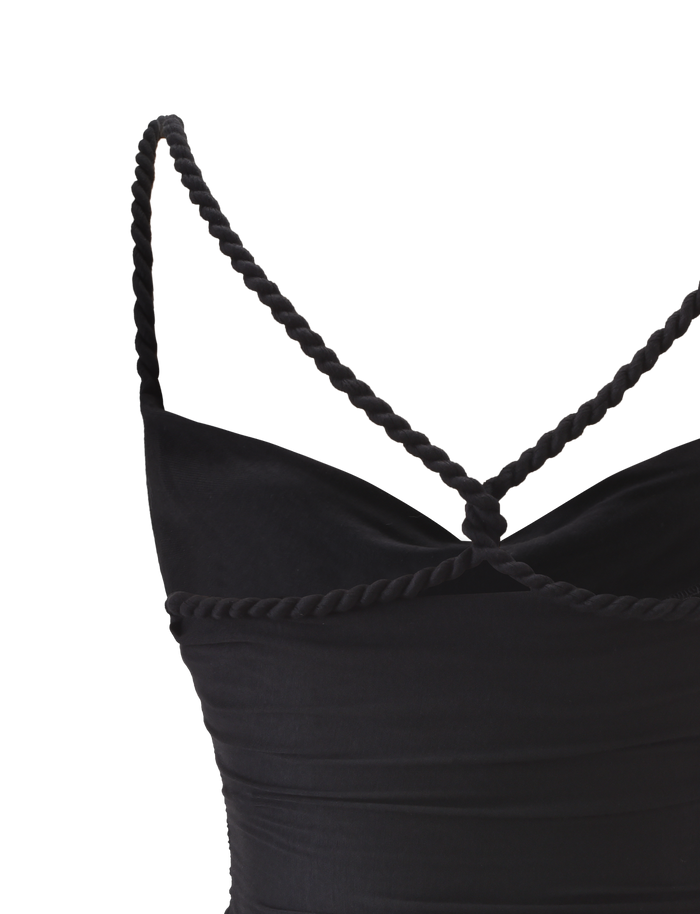 Close-up of the TIGERMIST LIOLA TOP - BLACK featuring braided rope straps that cross at the open back and wrap around the top edge. The smooth, fitted fabric stands out against a plain white background.