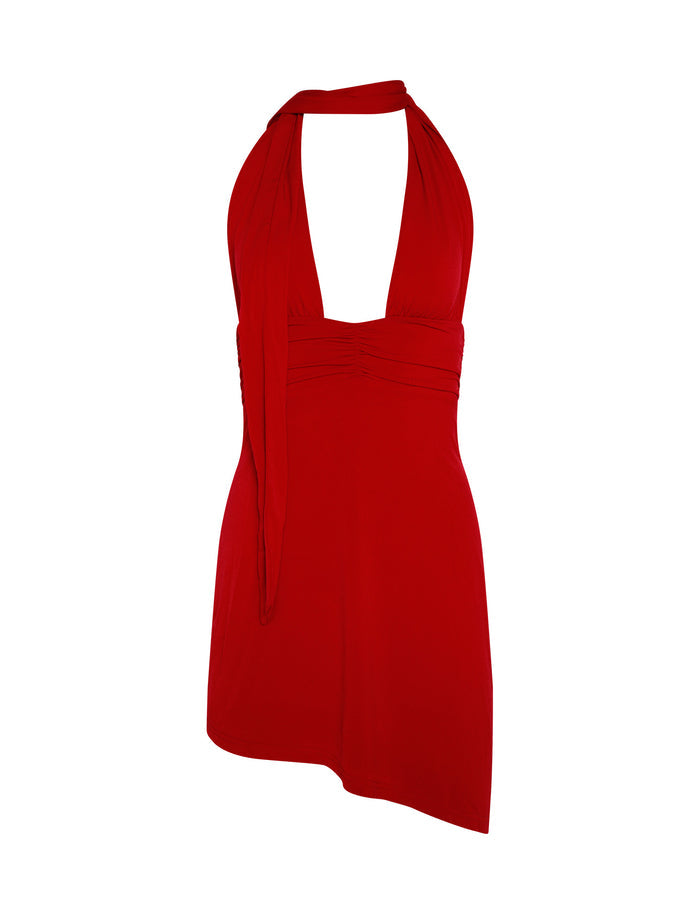 Introducing the LUNA DRESS - RED : FIRE ENGINE RED by TIGERMIST, featuring a sleeveless design and deep V-neckline with a halter neck. This striking short red dress has an asymmetrical hemline, with one side longer than the other. The fabric fits snugly at the bust and gradually flares out towards the bottom.