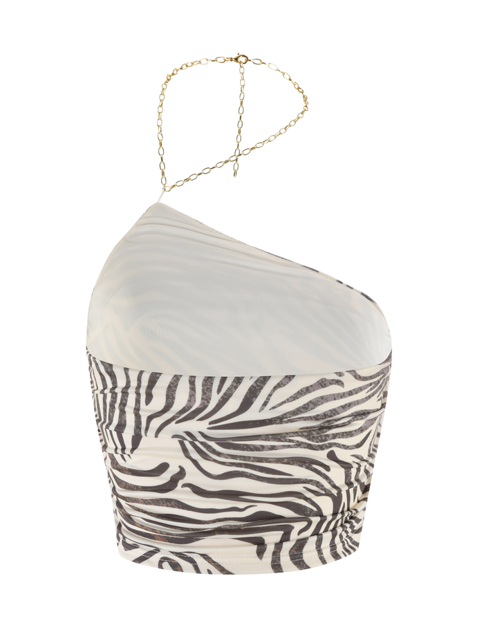 The TIGERMIST LYRA TOP - NEUTRAL : ZEBRA is an asymmetric one-shoulder crop top with a black and white zebra print, gold chain strap, fitted ruched detailing, and a stylish cropped length.