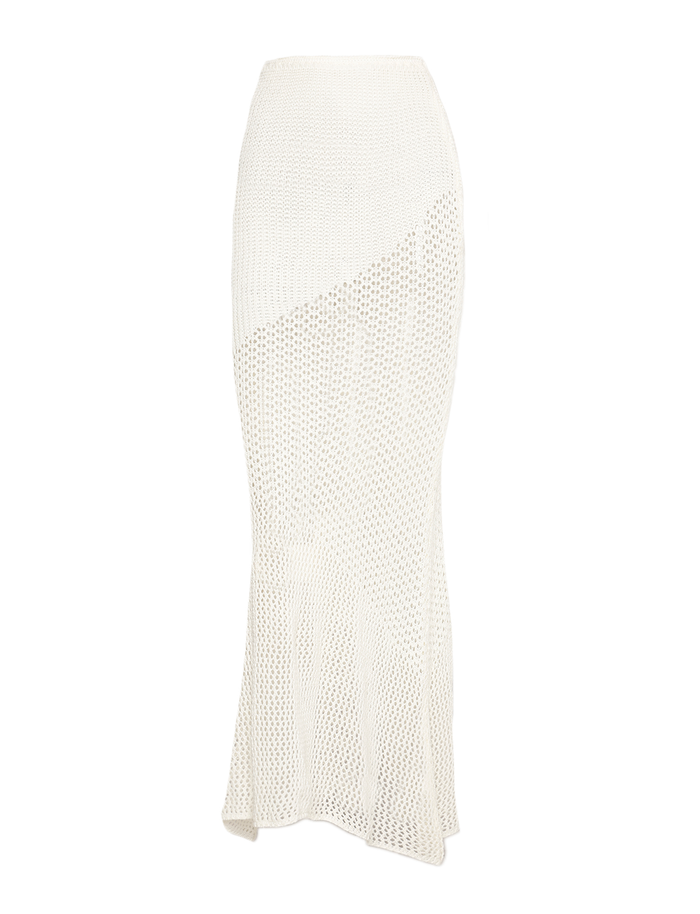 The TIGERMIST MACAULEY SKIRT in Cream Crochet is a long, fitted waist skirt with crochet panels, a slightly flared hem, semi-sheer texture, and asymmetrical pattern for a subtle bodycon look.