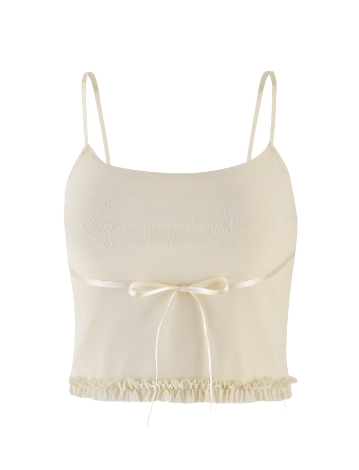 The TIGERMIST MAISIE TOP in pale yellow features adjustable shoulder straps, a fitted bodice, a satin ribbon bow at the front, and a ruffled hem for a delicate touch.