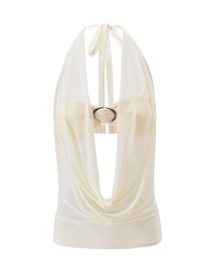 The MAKENA TWO-PIECE TOP - IVORY by TIGERMIST is a sleeveless, sheer mesh top with a draped cowl neckline, open back, and metallic silver ring at the bust—perfect for layering over a strapless bra. Shown on a plain white background.