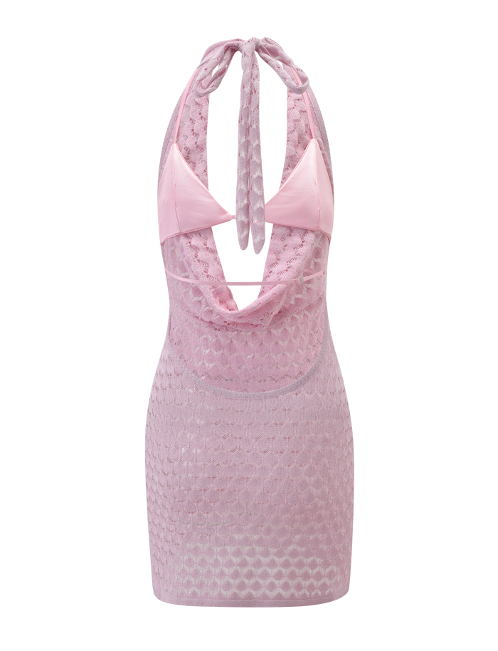 The MAKENZIE CROCHET MINI DRESS - SHIMMER PINK by TIGERMIST is a sleeveless mini featuring a shimmer finish, halter neck tie, sheer mesh overlay with geometric pattern, deep cowl neckline, and a visible bra-style top beneath.