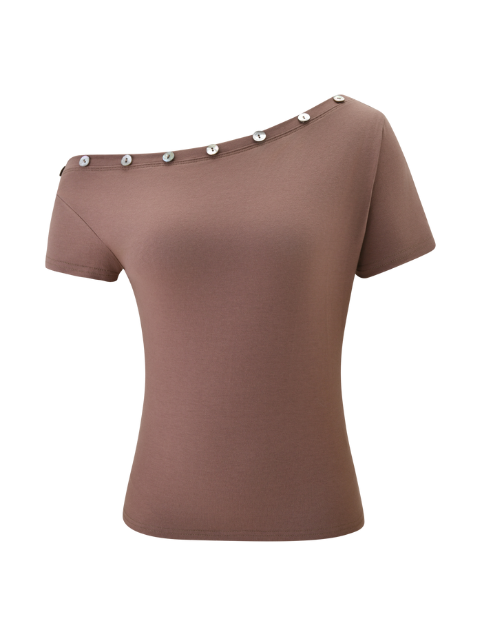 The TIGERMIST MARITA TOP in mocha is an off-shoulder, short sleeve top with an asymmetrical neckline and metallic button accents, shown against a plain white background.