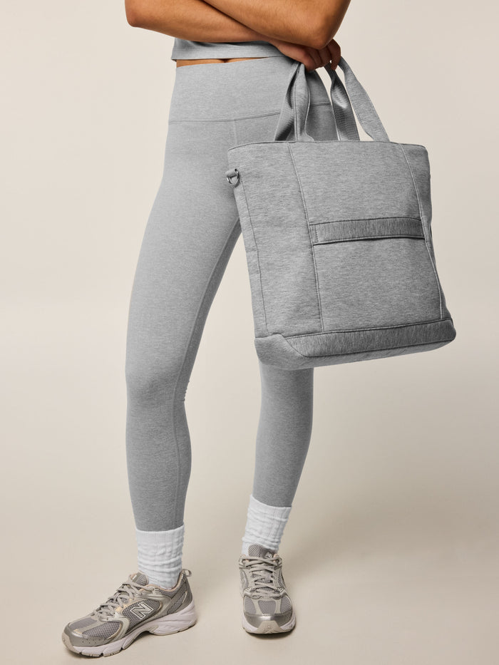 Greyson Clothiers Melange Kristina Tote in Light Grey Heather - On Model Side View, Carried by Hand