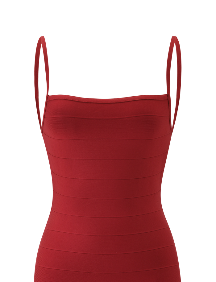 Sure! Here’s a rewritten version using your product data: The MIDORI BANDAGE MIDI DRESS in cherry by TIGERMIST is a fitted midi dress with thin shoulder straps and distinctive horizontal panel detailing. Photographed against a plain white background, the design highlights the dress’s shape and texture.