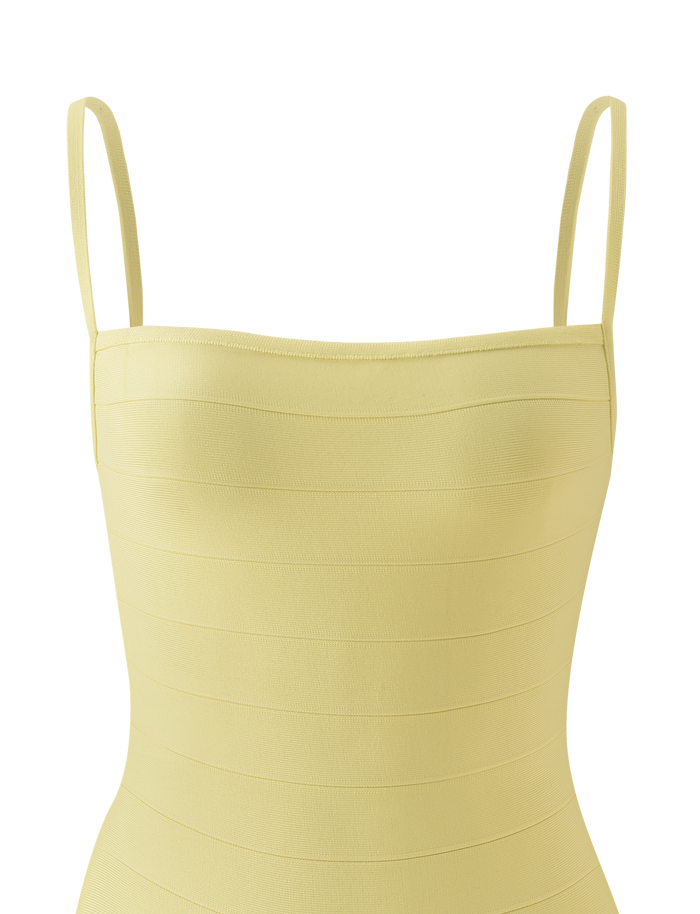 A close-up of the TIGERMIST MIDORI BANDAGE MINI DRESS in yellow, featuring a sleeveless, bodycon silhouette with thin straps and horizontal paneling, displayed on a plain white background.