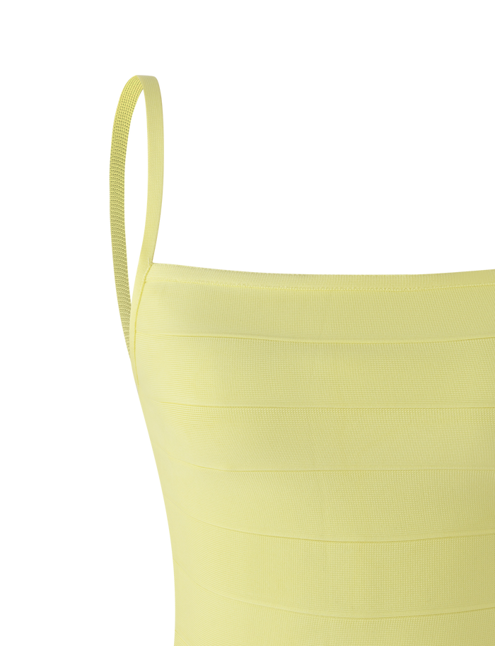 A close-up of the TIGERMIST MIDORI BANDAGE TOP in yellow, featuring a square neckline.