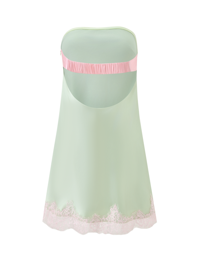 The MILYANA MINI DRESS by TIGERMIST is a pale green satin, strapless dress with a sweetheart neckline, pink elastic band across the upper back, and a delicate pink lace hem.