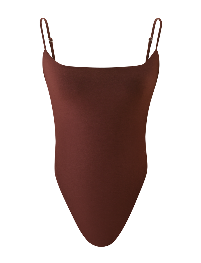 The TIGERMIST MINERVA BODYSUIT in chocolate is a sleeveless, backless one-piece with thin adjustable straps and a G-string bottom, shown against a white background.