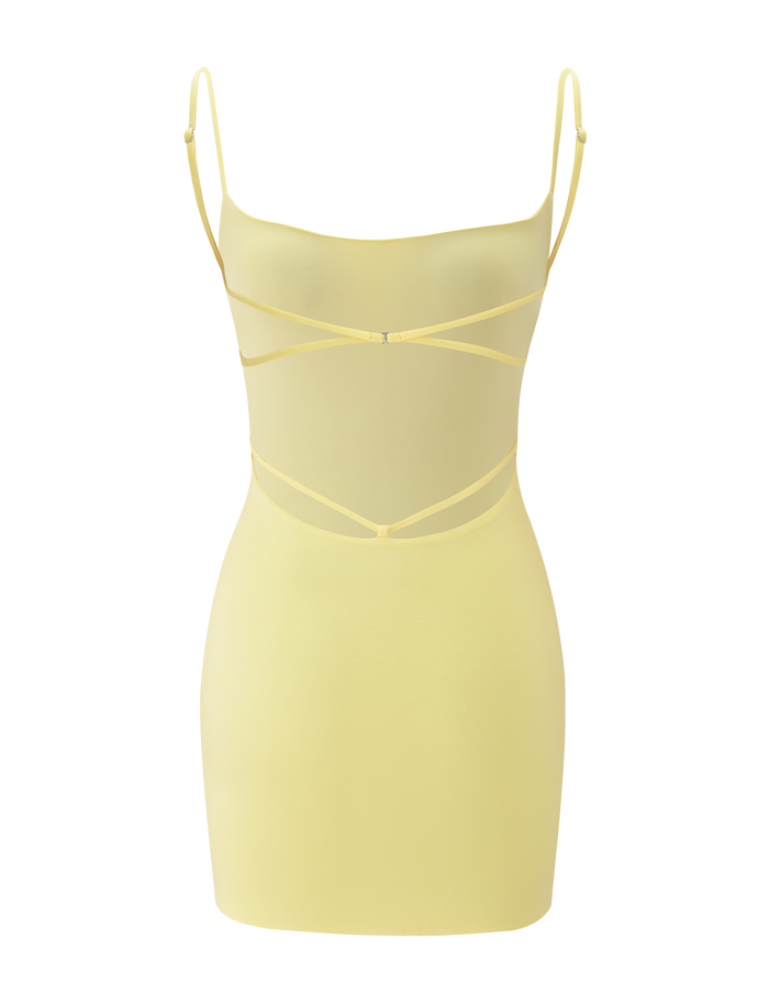 The TIGERMIST MINERVA MINI DRESS in butter yellow is a sleeveless, bodycon mini dress with thin spaghetti straps and crisscross details on the chest and waist, shown against a plain white background.