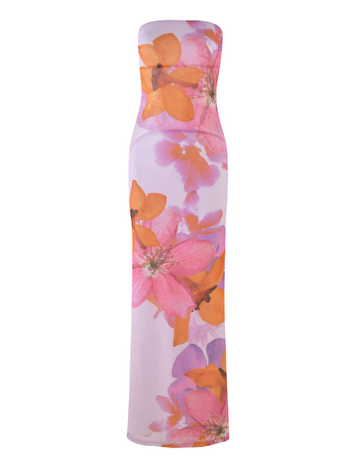 A strapless, floor-length bodycon dress from the TIGERMIST collection "BY POPPY SUMMER" called the MORGAN DRESS - PINK, featuring a vibrant floral print in shades of pink, orange, and purple on a light background.