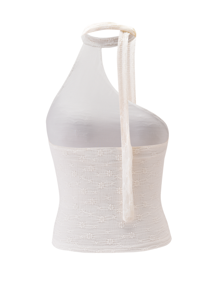 The MYLAH ONE SHOULDER TOP - IVORY by TIGERMIST is a sleeveless lace knit with textured detail, featuring a single tie strap at the neck. Its back view showcases an asymmetrical neckline and subtle woven accents.