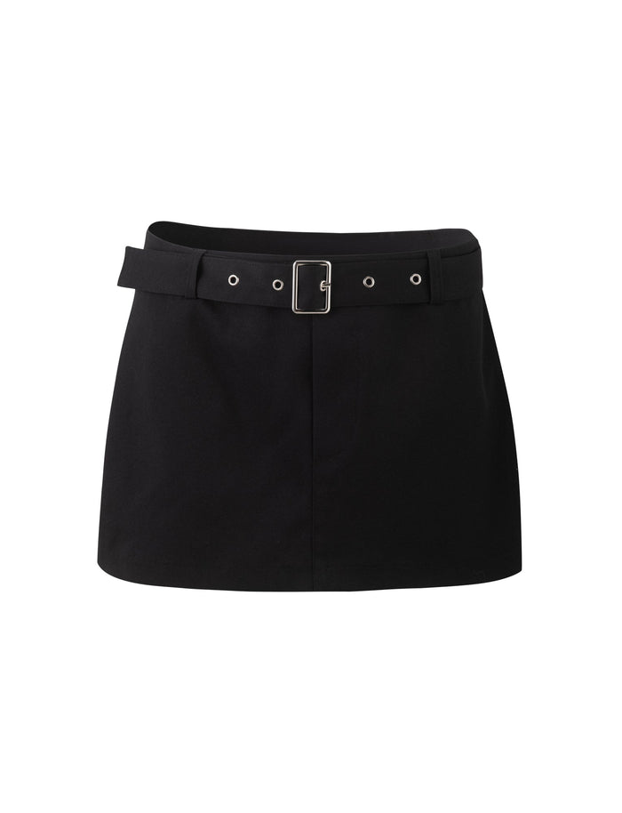 The NADINE SKORT - BLACK from TIGERMIST is a black mini skirt that includes a matching black belt with a silver buckle and eyelets. The skort features a straight, simple design without any additional embellishments.