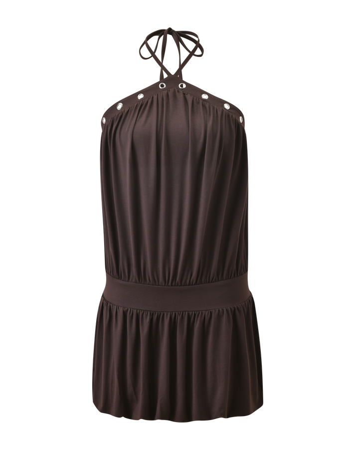 The TIGERMIST NATASHA DRESS - CHOCOLATE is a sleeveless mini dress featuring a halter neckline with silver grommet accents, a wide elastic waistband, and a softly flared buttery jersey skirt for an elegant silhouette.