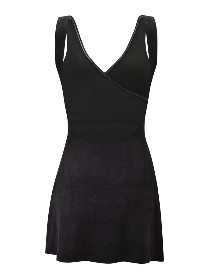 The NURA MINI DRESS by TIGERMIST is a sleeveless black mini dress with a V-neckline, fitted bodice, slight skirt flare, subtle pattern on the lower half, and an elegant open back—perfect for a chic look.