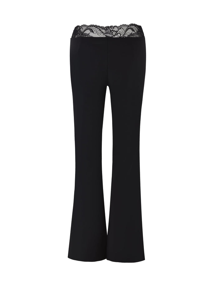 The NYOMI PANT - BLACK by TIGERMIST showcases a flared leg design with a delicate lace detail around the waist, presented on a white background.