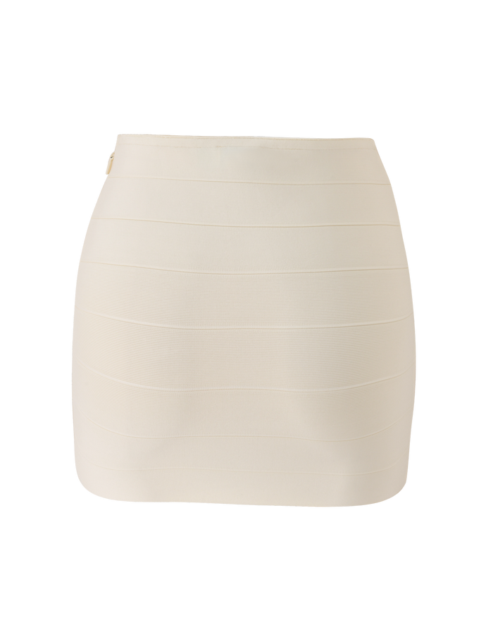 The TIGERMIST NYX BANDAGE MINI SKIRT in cream is a high-waisted, body-hugging mini skirt featuring subtle horizontal seams. Shown against a white background, it offers a sleek, off-white silhouette.