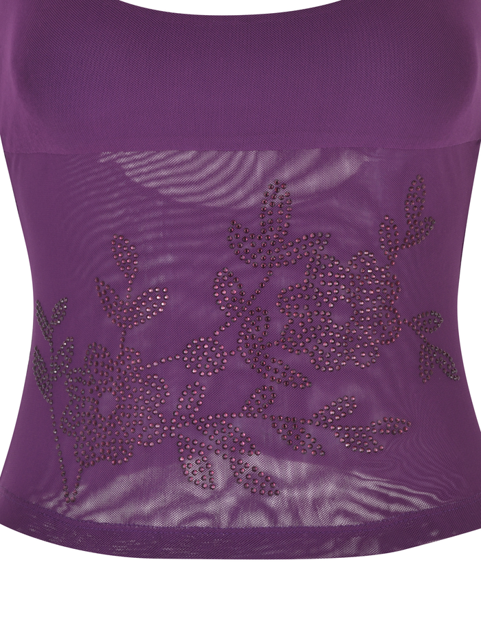 The OCTAVIA TOP by TIGERMIST is a fitted, semi-transparent purple mesh top featuring shiny floral stud embellishments and intricate flower and leaf designs for an elegant look.
