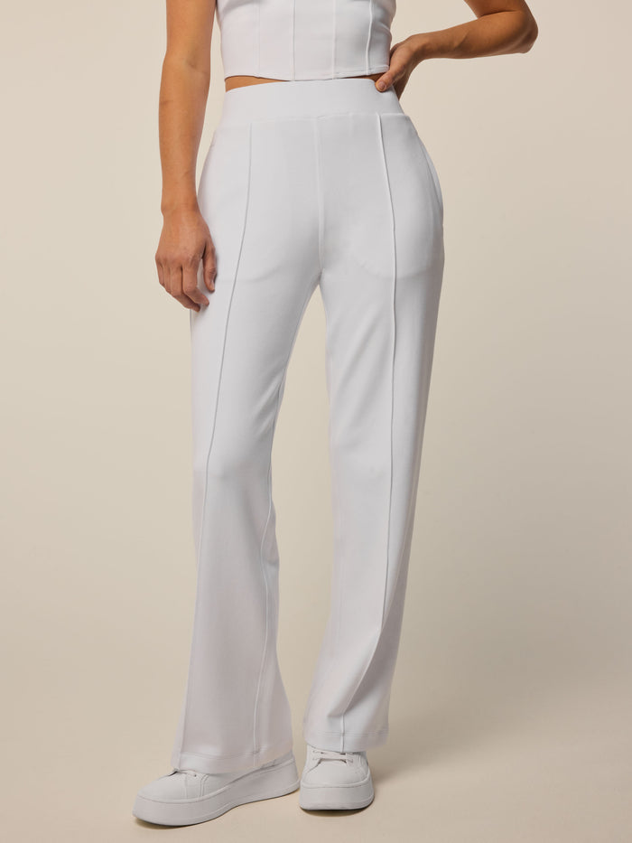 Arctic Ojai Luxe Pant - Side Front View, Wide Leg Stretch Pant with Welt Pocket On Model | Greyson Clothiers