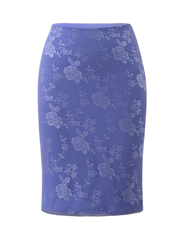 TIGERMIST’s ORLY MIDI SKIRT in Cornflower Blue Tonal showcases a fitted 90s-inspired midi silhouette, detailed with an all-over floral lace pattern in soft blue hues—perfect as a standout skirt for garden parties.