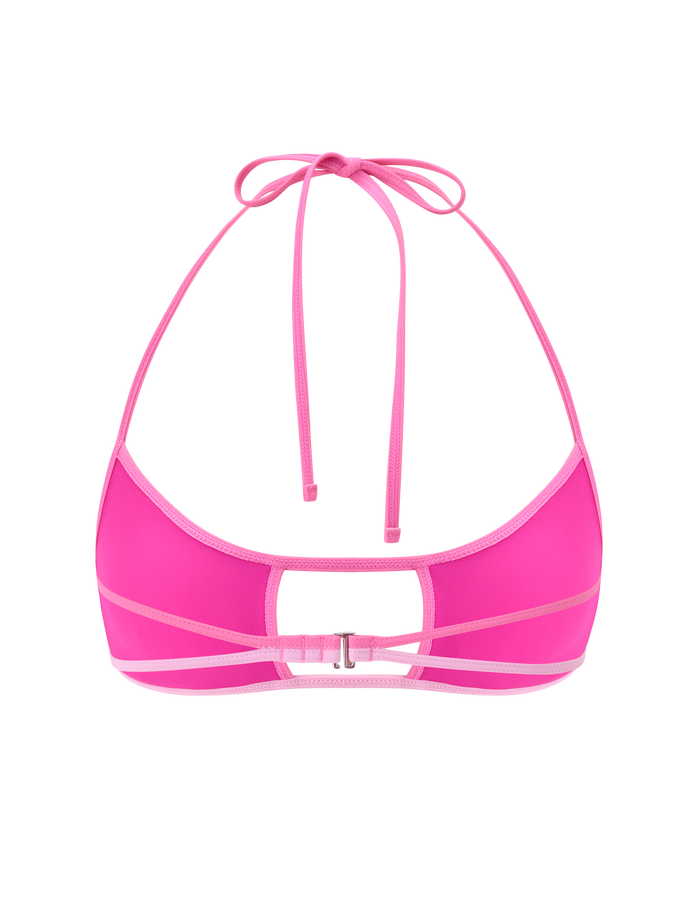 The PALMER BIKINI TOP - BERRY by TIGERMIST features a vibrant pink hue, adjustable halter neck straps, back clasp closure, and a center cut-out. Its modern design pops against a plain white background.
