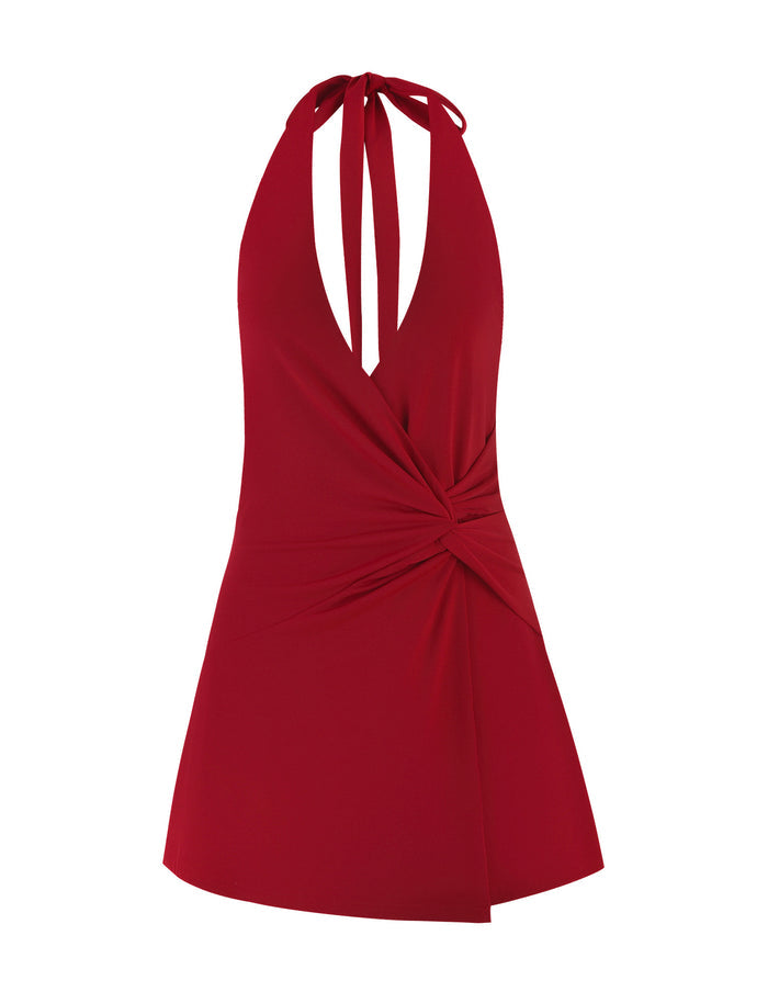 Introducing the PARRIS DRESS - RED by TIGERMIST: A vibrant red sleeveless halter-neck mini dress featuring a plunging neckline and twist detailing at the hip. This chic piece boasts an asymmetrical hemline and a smooth, fitted silhouette, exuding elegance and style.
