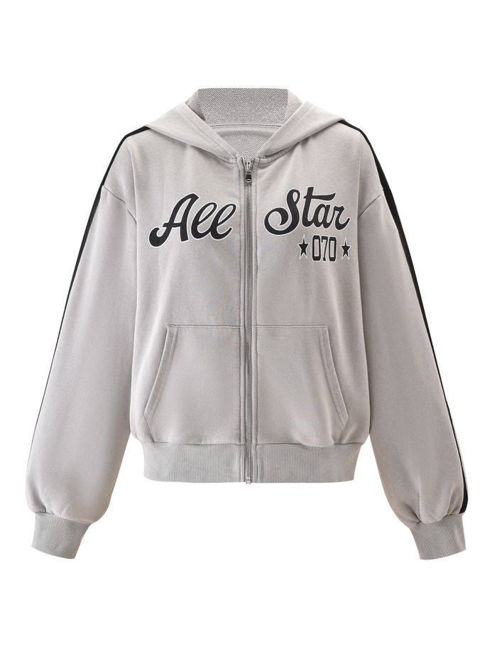 The PAYTON HOODIE - STONE by TIGERMIST is a light gray, vintage-style 100% cotton hoodie with front pockets, black "All Star 070" text and stars on the chest, plus bold black stripes on the shoulders and sleeves.