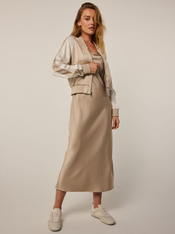 Sand Pegasus Women's Bomber Jacket - Full Body Side View, Styled with Midi Skirt | Greyson Clothiers