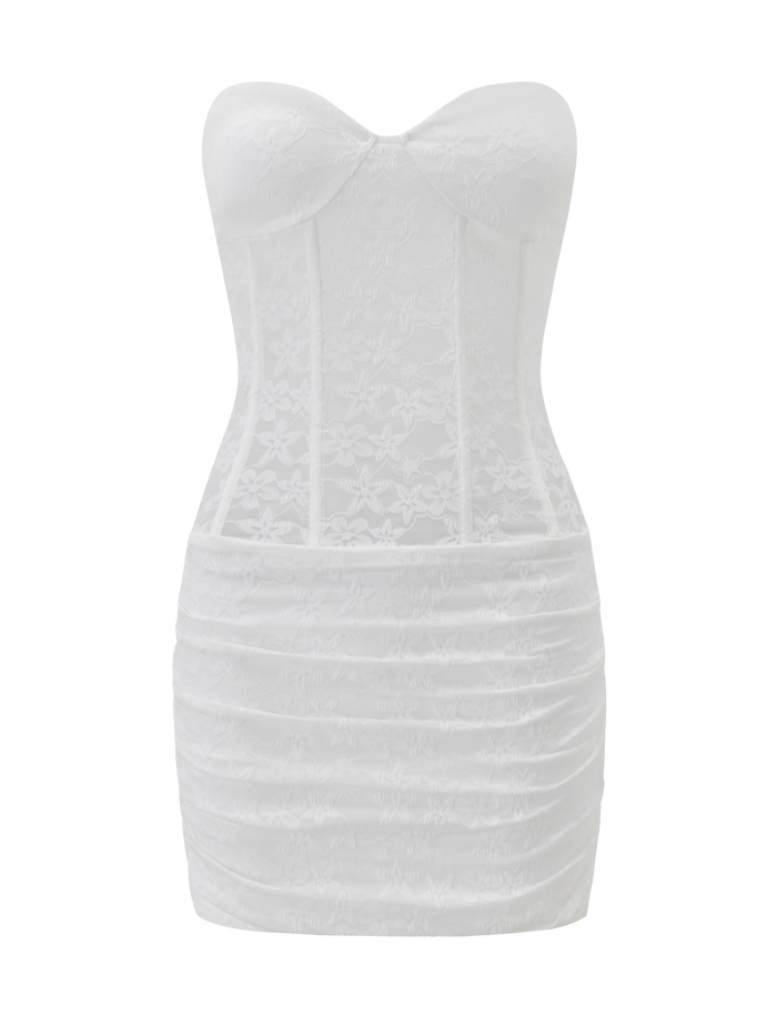 The PETRA MINI DRESS by TIGERMIST features a strapless sweetheart neckline, corset-style bodice, floral white lace, and a ruched mini skirt. Shown on a plain white background.