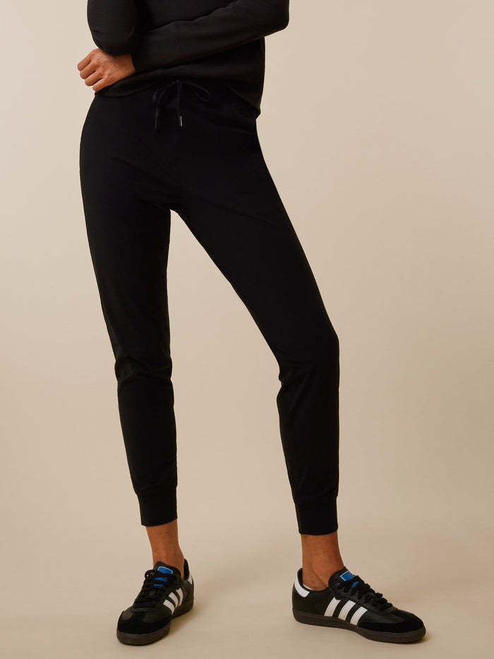 Black Phoenix Jogger Tapered Fit with Drawstring Waist - Front View On Model | Greyson Clothiers