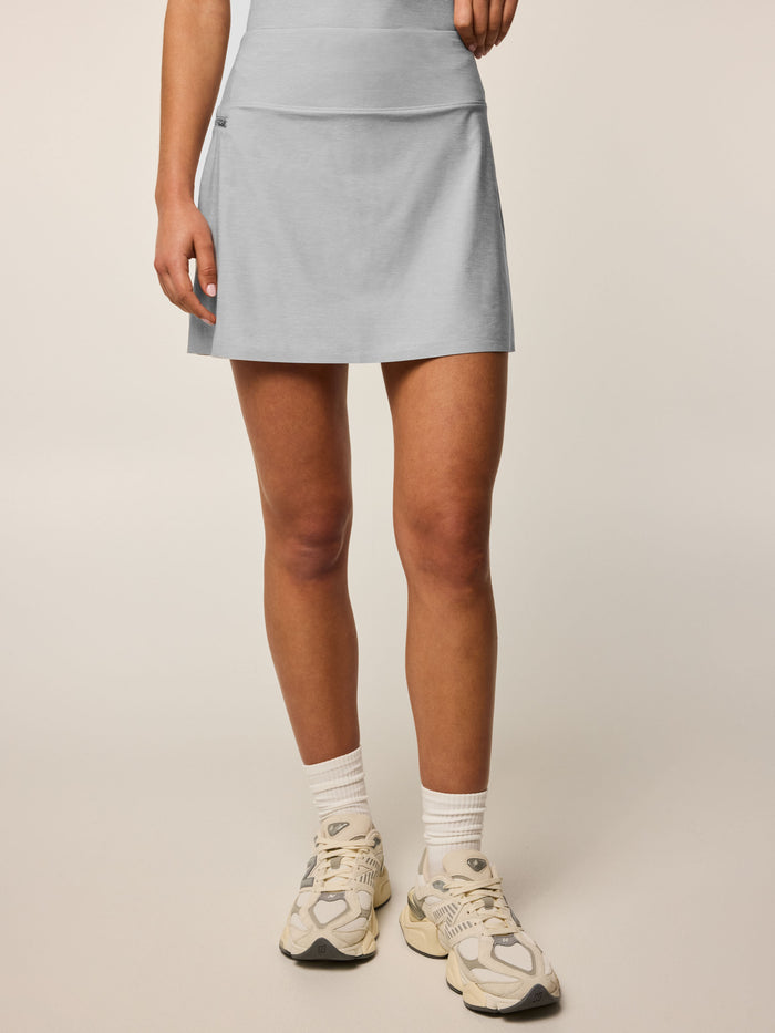 Greyson Clothiers Phoenix Melange Skirt in Light Grey Heather - Front View | Women's Golf Skort