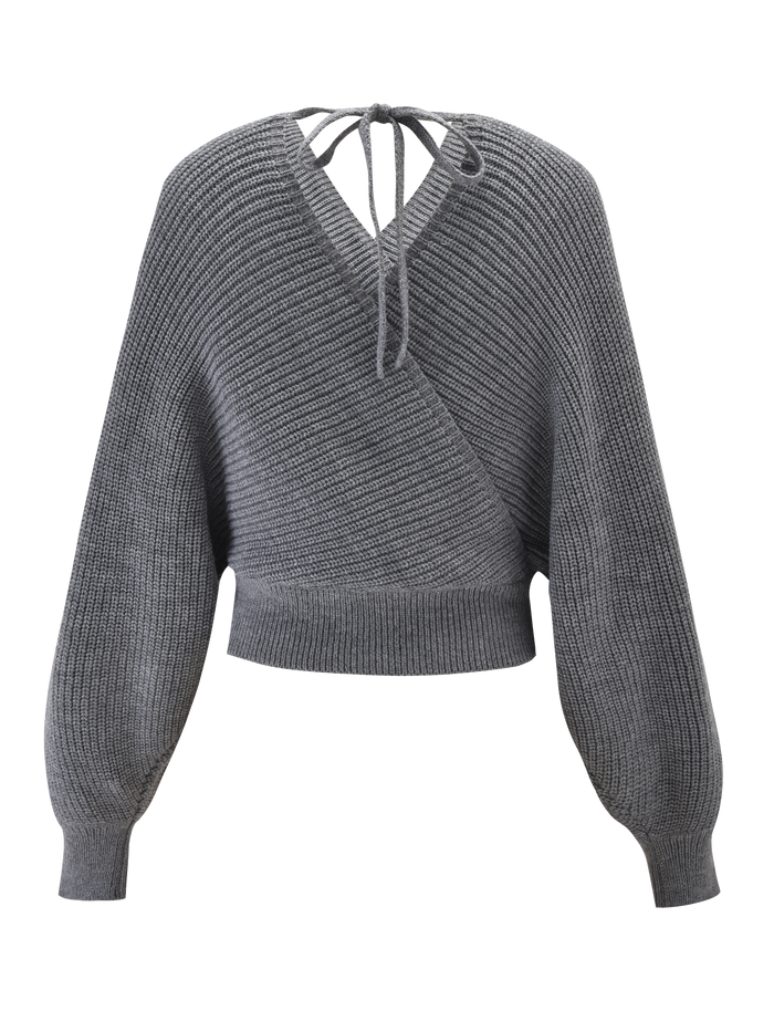 The RAVEN JUMPER - GREY by TIGERMIST is a chic faux wrap knit with long sleeves, ribbed cuffs and hem, plus an open back tied at the neckline—blending comfort and style for a versatile look.