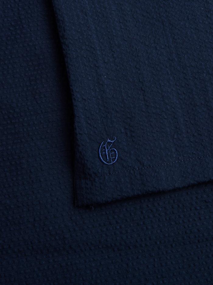 Maltese Blue Seersucker Camp Shirt - Sleeve Logo Embroidery Detail | Greyson Clothiers