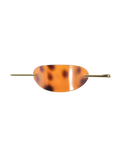 The TIGERMIST RUKA BARETTE - TORTOISESHELL is a chic acrylic hair accessory with a curved oval shape and a slender gold bar closure threaded through end holes.