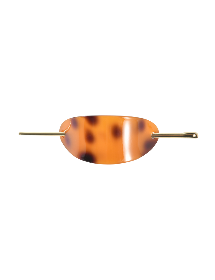 The TIGERMIST RUKA BARETTE - TORTOISESHELL is a chic acrylic hair accessory with a curved oval shape and a slender gold bar closure threaded through end holes.