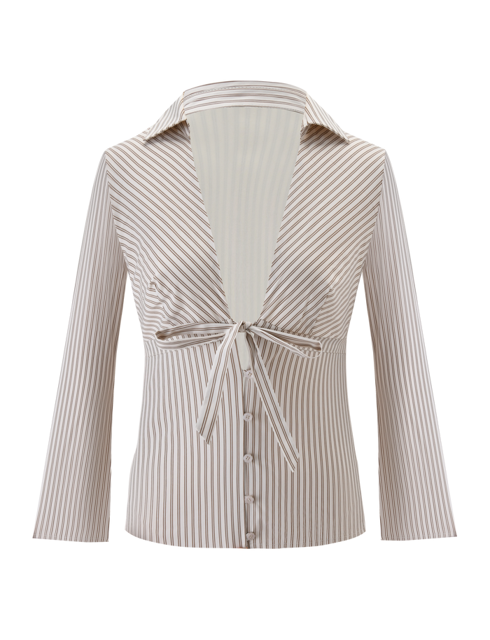 The SABRINE SHIRT by TIGERMIST features beige and white vertical stripes, long sleeves, a plunging V neckline with wide collar, front tie at the bust, and button-down front.