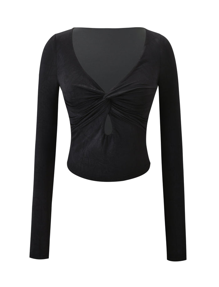 The SAFFIRA LONG SLEEVE TOP by TIGERMIST is a black top with a low-cut V neckline, front twist detail, and keyhole accent beneath the twist, shown on a plain white background.