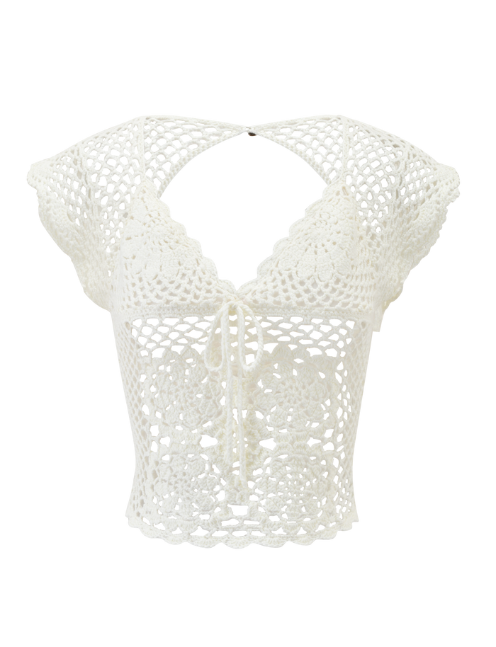 The SASHA CROCHET TOP - IVORY by TIGERMIST features corset-style details, scalloped cap sleeves, a tie-front closure, and intricate openwork floral patterns.