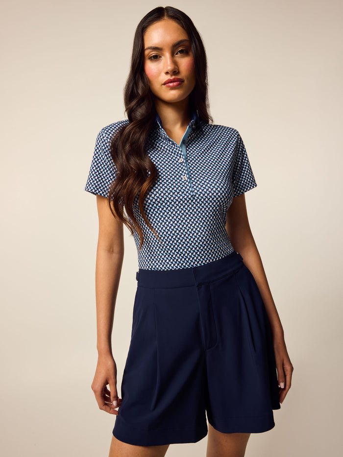 Maltese Blue Scarlett Wolf Whisperer Short Sleeve Polo - Front View, Women's Premium Golf Polo | Greyson Clothiers