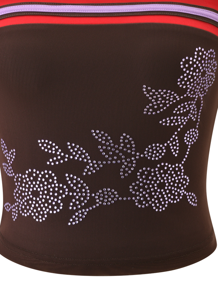 The SERAH DIAMANTE BOOB TUBE in Chocolate by TIGERMIST features brown mesh with white rhinestone floral artwork and red and purple stripes, making it a chic and exclusive choice.