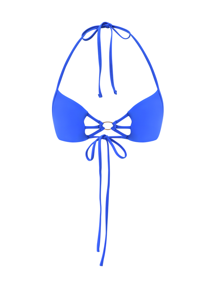 The SHARLI BIKINI TOP by TIGERMIST in cobalt blue features a halter neck, long thin ties, gold center ring detail, three side cutouts, and extra bottom ties for fastening.
