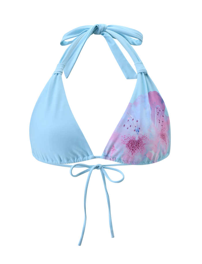The SID BIKINI TOP - BLUE by TIGERMIST features adjustable neck and back ties and a pink and purple floral pattern on one side, blending comfort with style.