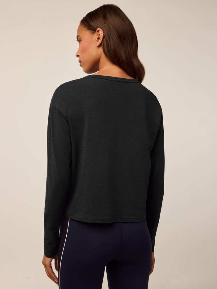 Shepherd Sloane Long Sleeve Tee - Back View On Model with Leggings | Greyson Clothiers