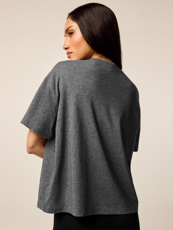 Smoke Heather Sloane Cropped Active Tee - Back View On Model with Wolf Logo Detail | Greyson Clothiers
