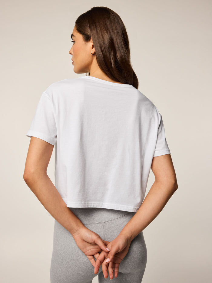 Arctic White Sloane Short Sleeve Tee - Back View Styled with Grey Leggings | Greyson Clothiers