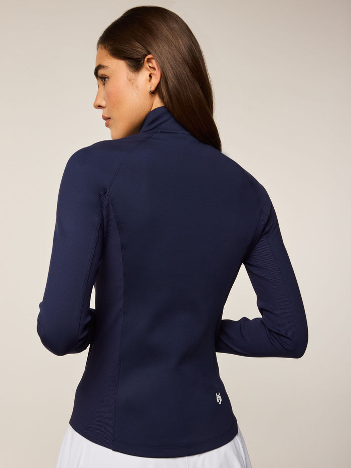 Greyson Clothiers Soleil Full-Zip Jacket Maltese Blue - Back View On-Model, Wolf Logo at Hem