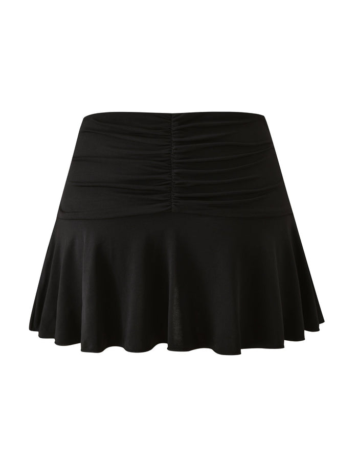 The SOLIA MINI SKIRT - BLACK by TIGERMIST is a black flared mini skirt featuring a ruched, gathered waistband. This stylish skirt offers a smooth texture with a gently flowing, loose fit at the bottom and is finished with a subtle ruffled hem for added movement and style.